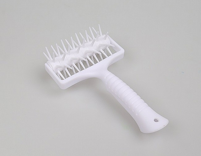 גלגלת קוצים לבצק/פיצה פלסטי 13 ס"מ